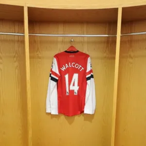Arsenal Football Club: Theo Walcott in the Changing Room before Arsenal vs Fulham (2012-13)