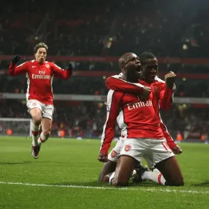 Arsenal Forward William Gallas Celebrates Scoring the Decisive Goal Against Hull City in FA Cup Sixth Round, Surrounded by Teammates Johan Djourou, Abou Diaby, and Sami Nasri Arsenal Forward William Gallas Celebrates Scoring the Decisive Goal Against Hull City in FA Cup Sixth Round, Surrounded by Teammates Johan Djourou, Abou Diaby, and Sami Nasri