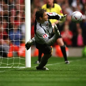 Arsenal goalkeeper Jens Lehmann prepares to save the 2nd Manchester United penalty taken by Paul Sch