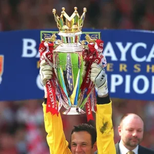 Arsenal goalkeeper Richard Wright lifts the F. A. Barclaycard Premiership Trophy Arsenal goalkeeper Richard Wright lifts the F. A. Barclaycard Premiership Trophy