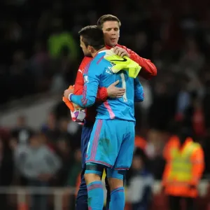 Arsenal Goalkeepers Szczesny and Fabianski Embrace Post-Match: A Moment of Sportsmanship between Rivals (Arsenal vs Swansea City, Premier League 2014/15) Arsenal Goalkeepers Szczesny and Fabianski Embrace Post-Match: A Moment of Sportsmanship between Rivals (Arsenal vs Swansea City, Premier League 2014/15)