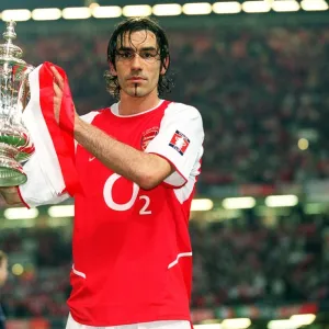 Arsenal goalscorer Robert with the FA Cup after the match