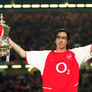 Arsenal goalscorer Robert with the FA Cup after the match