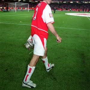 Arsenal goalscorer Robert Pires with the F. A. Cup Arsenal goalscorer Robert Pires with the F. A. Cup