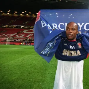Arsenal goalscorer Sylvain Wiltord celebrates after the match Arsenal goalscorer Sylvain Wiltord celebrates after the match