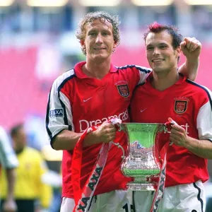 Arsenal goalscorers Ray Parlour and Fredrik Ljungberg with the F. A