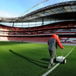 Arsenal Groundsman Prepares Emirates Stadium Pitch for Arsenal vs West Bromwich Albion (2016-17)
