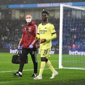 Arsenal: Jordan Reece Tends to Injured Bukayo Saka during Arsenal vs Brighton (2021-22)