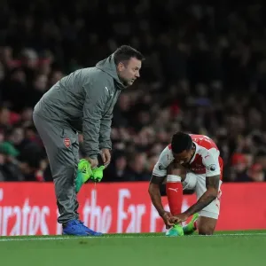 Arsenal: Kitman Paul Akers Prepares Theo Walcott for Arsenal v Leicester City (2016-17) Arsenal: Kitman Paul Akers Prepares Theo Walcott for Arsenal v Leicester City (2016-17)