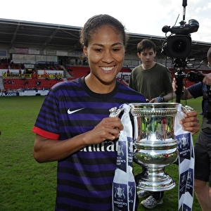 Arsenal Ladies Celebrate FA Women's Cup Victory: Rachel Yankey Lifts the Trophy