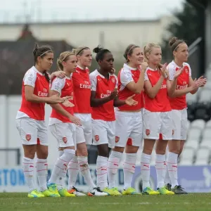 Print of Arsenal Ladies line up to watch penalty shootout
