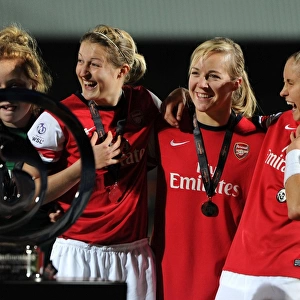 Arsenal Ladies Triumph in FA WSL Continental Cup Final: Ellen White, Gemma Davison, and Steph Houghton Celebrate with the Trophy
