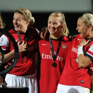 Arsenal Ladies Triumph in FA WSL Continental Cup Final: Ellen White, Gemma Davison, and Steph Houghton Celebrate with the Trophy Arsenal Ladies Triumph in FA WSL Continental Cup Final: Ellen White, Gemma Davison, and Steph Houghton Celebrate with the Trophy