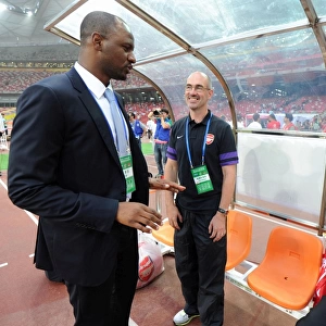 Arsenal Legends Reunited: Vieira and Wenger Before Manchester City Clash in Beijing, 2012