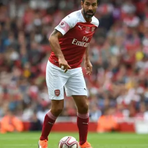 Arsenal Legends vs Real Madrid Legends: A Clash of Football Greats - Robert Pires in Action