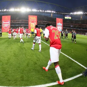 Arsenal and Liverpool line up before the match