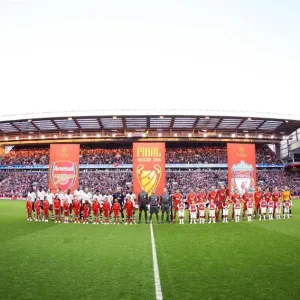 The Arsenal and Liverpool teams line up before the match The Arsenal and Liverpool teams line up before the match