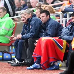 Arsenal manager Arsene Wenger and assistant Pat Rice during the match Arsenal manager Arsene Wenger and assistant Pat Rice during the match