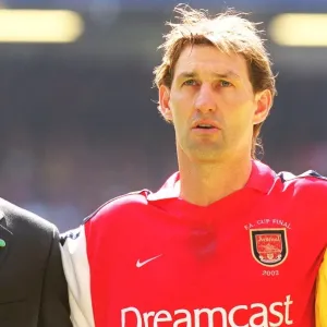 Arsenal manager Arsene Wenger with captain Tony Adams before the match