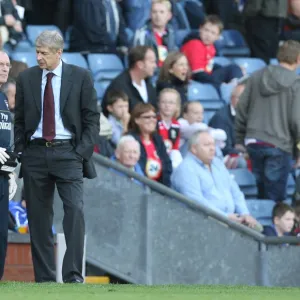 Arsenal manager Arsene Wenger with club doctor Ian Beasley