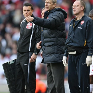 Arsenal manager Arsene Wenger and club doctor Ian Beasley