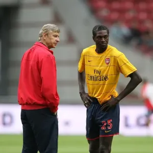 Arsenal manager Arsene Wenger with Emmanuel Adebayor Arsenal manager Arsene Wenger with Emmanuel Adebayor