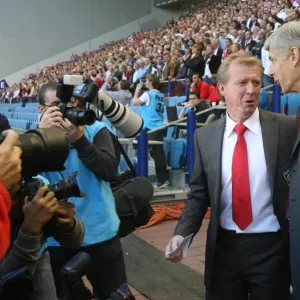 Arsenal manager Arsene Wenger with FC Twente manager Steve McClaren Arsenal manager Arsene Wenger with FC Twente manager Steve McClaren