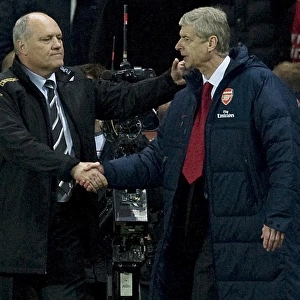Arsenal manager Arsene Wenger and Fulham manager Martin Jol after the Barclays Premier League match between Arsenal and Fulham at Emirates Stadium on November 26, 2011 in London, England. Credit; Arsenal