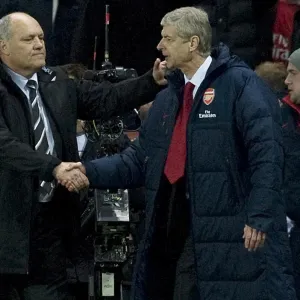 Arsenal manager Arsene Wenger and Fulham manager Martin Jol after the Barclays Premier League match between Arsenal and Fulham at Emirates Stadium on November 26, 2011 in London, England. Credit; Arsenal