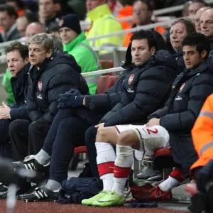 Arsenal manager Arsene Wenger with physio Colin Lewin