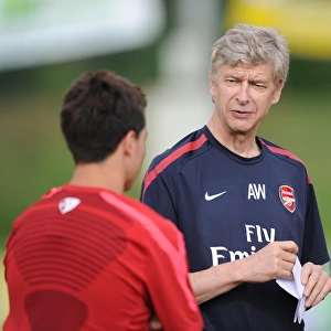 Arsenal manager Arsene Wenger with Samir Nasri. Arsenal Training Camp, Bad Waltersdorf