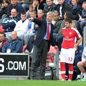 Arsenal manager Arsene Wenger with substitute Fran Merida. Wigan Athletic 3: 2 Arsenal