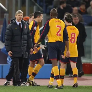 Arsenal manager Arsene Wenger talks with Abou Diaby