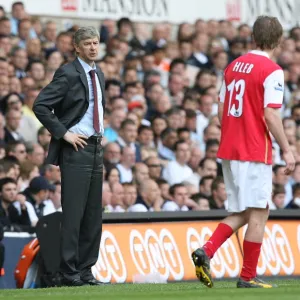 Arsenal manager Arsene Wenger talks with Alex Hleb