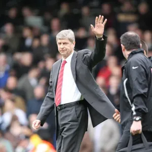Arsenal manager Arsene Wenger waves to the fans before the match Arsenal manager Arsene Wenger waves to the fans before the match