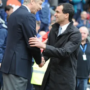 Arsenal manager Arsene Wenger with Wigan manager Roberto Martinez. Wigan Athletic 3