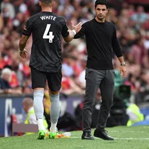 Arsenal Manager Mikel Arteta with Ben White at Manchester United vs Arsenal, 2022-23 Premier League