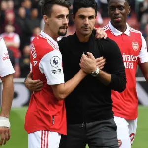 Arsenal Manager Mikel Arteta Celebrates with Fabio Vieira After Arsenal's Victory Against Tottenham Hotspur (2022-23)