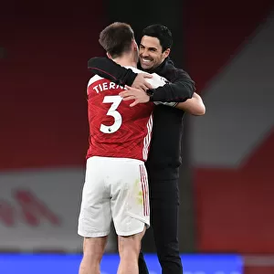 Arsenal Manager Mikel Arteta Embraces Kieran Tierney After Arsenal vs. Tottenham Hotspur Match, 2020-21 Premier League