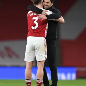 Arsenal Manager Mikel Arteta Embraces Kieran Tierney After Arsenal vs. Tottenham Hotspur Match, 2020-21 Premier League