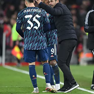 Arsenal Manager Mikel Arteta with Gabriel Martinelli at Liverpool's Anfield - Carabao Cup Semi-Final First Leg