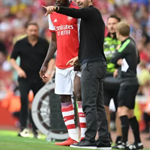 Arsenal Manager Mikel Arteta with Thomas Partey: Arsenal vs Norwich City, Premier League 2021-22