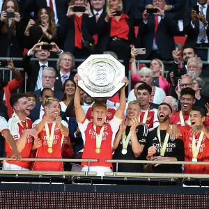 Arsenal: Martin Odegaard Lifts the Community Shield Trophy (2023-24) Arsenal: Martin Odegaard Lifts the Community Shield Trophy (2023-24)