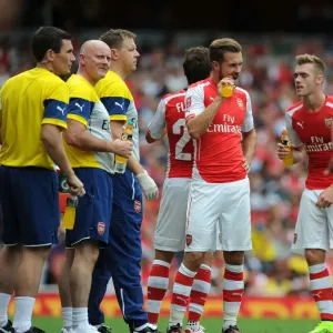 Arsenal Medical Team Tending to Calum Chambers and Aaron Ramsey during Arsenal v Benfica, Emirates Cup 2014-15 Arsenal Medical Team Tending to Calum Chambers and Aaron Ramsey during Arsenal v Benfica, Emirates Cup 2014-15
