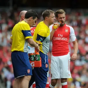 Arsenal Medical Team Tends to Aaron Ramsey During Arsenal v Benfica Match, Emirates Cup 2014-15 Arsenal Medical Team Tends to Aaron Ramsey During Arsenal v Benfica Match, Emirates Cup 2014-15
