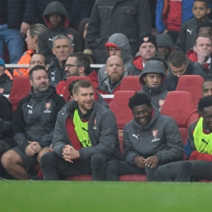 Arsenal: Mertesacker, Maitland-Niles, and Welbeck Share a Light-Hearted Moment Amidst Rivalry (Arsenal v Tottenham Hotspur, 2017-18)