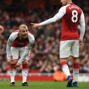 Arsenal Midfielders Jack Wilshere and Aaron Ramsey in Action against Stoke City, Premier League 2017-18 Arsenal Midfielders Jack Wilshere and Aaron Ramsey in Action against Stoke City, Premier League 2017-18