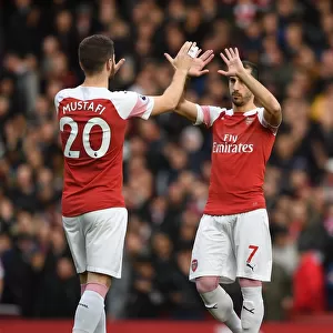Arsenal: Mustafi and Mkhitaryan's High-Five Moment before the Battle against Tottenham
