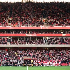 The Arsenal and Newcastle teams line up before the match The Arsenal and Newcastle teams line up before the match