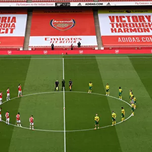 Arsenal and Norwich Players Honor The Fallen: A Minute's Silence before the Premier League Match (Arsenal v Norwich City, 2019-20)